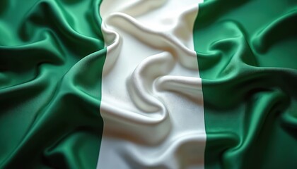 Obraz premium Nigerian flag made of shiny silk fabric waves gently. Green and white vertical stripes create a striking national symbol for independence and pride.