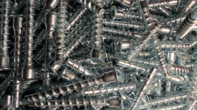 Close-up of self-tapping screws in natural light.