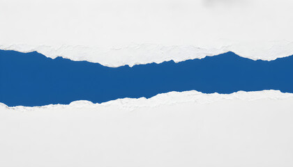 Torn paper revealing blue surface underneath