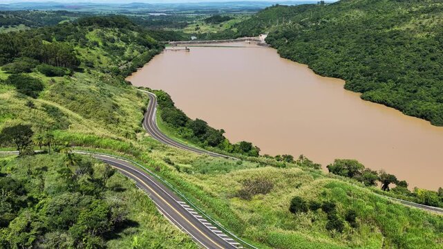 Euclides Da Cunha Hydroelectric In Sao Jose Do Rio Pardo Sao Paulo Brazil. Drone Capturing The Hydroelectric Producing Clean Energy. Landscape Dramatic Clouds Waterfall Tropical.