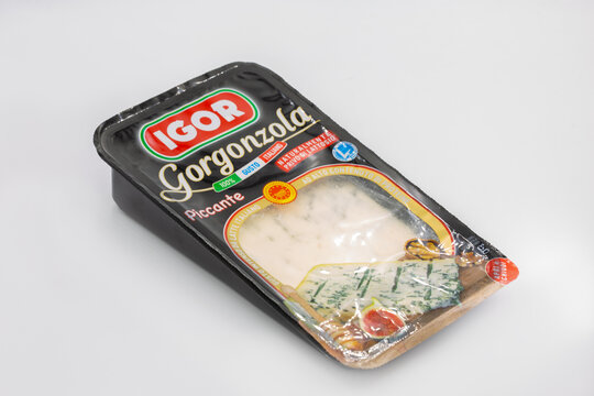 Igor Gorgonzola Piccante Italian blue cheese package closeup on white.