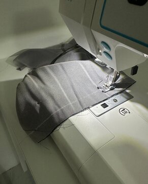 Professional Sewing Machine in Motion, Needle Sewing Cotton Fabric, Tailoring Concept