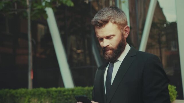 Professional man outside office building, Business professional scouting phone amid cityscape reflections