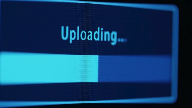 A computer screen displays an uploading progress bar with blue text and border.