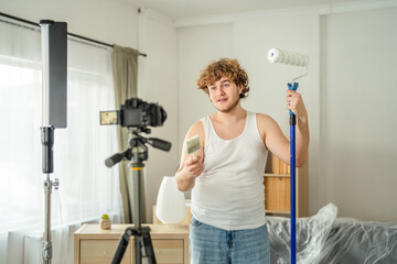 V-logger man filming diy home renovation content