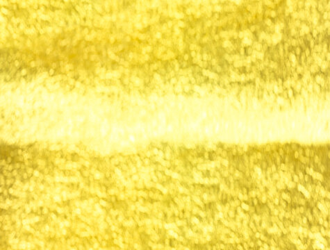 This abstract Japanese-style background features a vibrant golden yellow texture with soft out-of-focus bokeh highlights, creating a warm, shimmering, and luxurious atmosphere perfect for copy space.