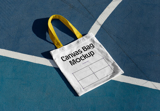 Tote Bag Lying on the Basketball Court Mockup