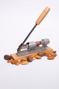 Portable pecan sheller on a white background
