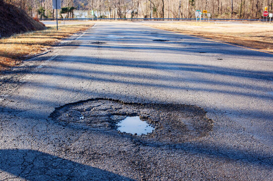 Large potholes in the road