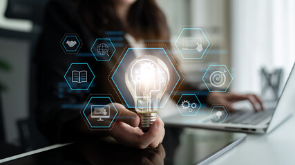 Head with gear and icons representing learning, digital training, and development process, showing...