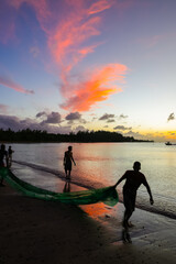 Fototapeta premium Fishermen on the coast of Mauritius Island, Tamarind Beach, Africa 