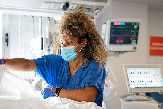 Female nurse working in an intensive care unit