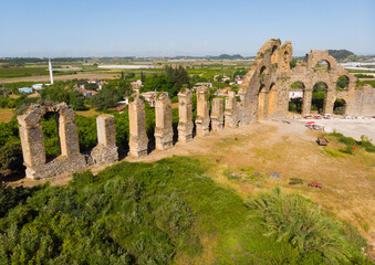Naklejka premium Drone photo of aquduct in ancient city Aspendos. Antalya Province, Turkey.
