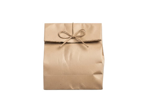 A brown paper parcel with a string tied around it isolated on transparent background