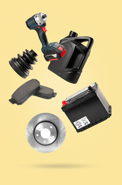 Levitating Car Auto Parts and Mechanic Tools on White Backgroundcar , battery, brake disc, brake pads, motor oil, and power drill.  modern garage  and auto repair .