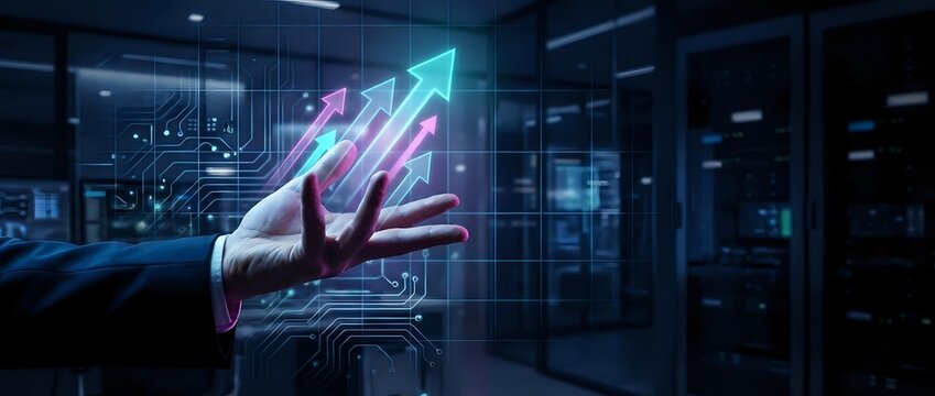 Businessman hand presenting holographic growth arrows in modern data center showcasing digital transformation and business success analytics.