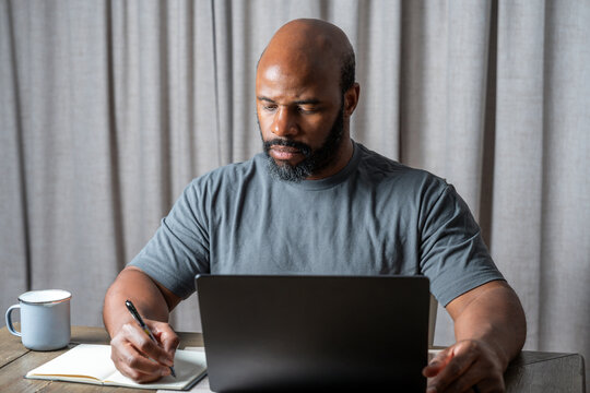 African American entrepreneur planning business strategy while working from home