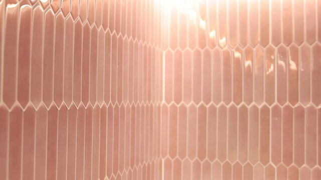 Peel and stick tiles on wall in kitchen, closeup. Camera moving in