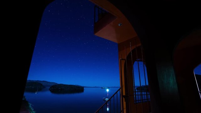Night from villa porch over ocean 