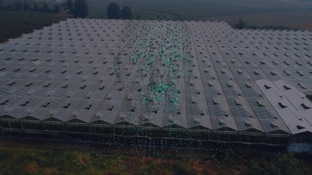 Farming greenhouse complex releasing green specks from center roof, forming rising plume dispersing