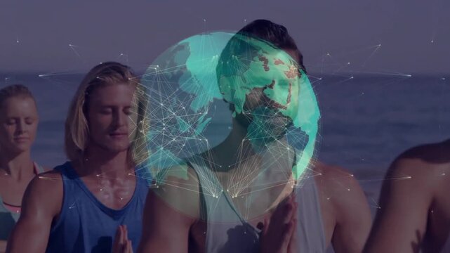 Central male holding prayer pose on beach, globe appearing with network lines guiding wellness