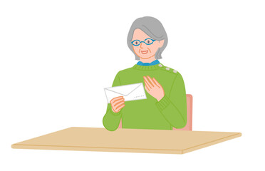 Senior woman holding envelope with relieved expression