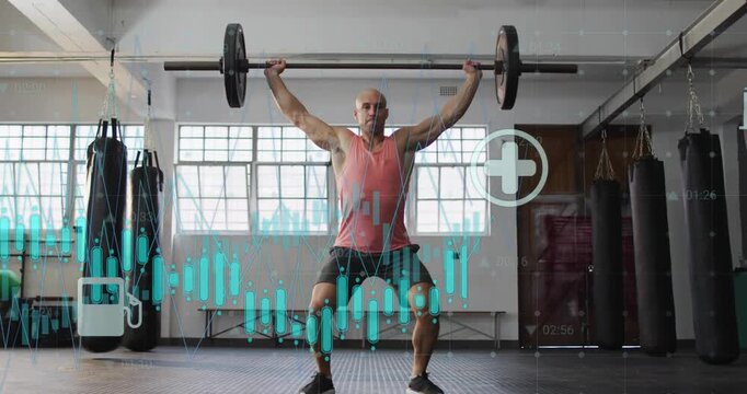 Pulling lifter doing snatch from setup to overhead squat at gym training pink tank barbell graphics