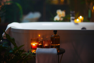 Candlelit Home Spa Accessories by a Freestanding Bathtub © Alliance