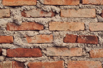 Obraz premium Raw Brick Wall Texture with Artistic Industrial Cement Finish