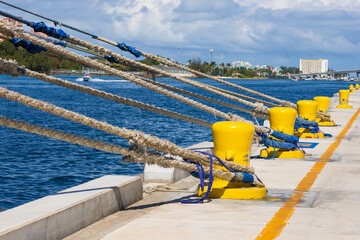 Mooring ropes securing cruise ship in Nassau port © SNEHIT PHOTO