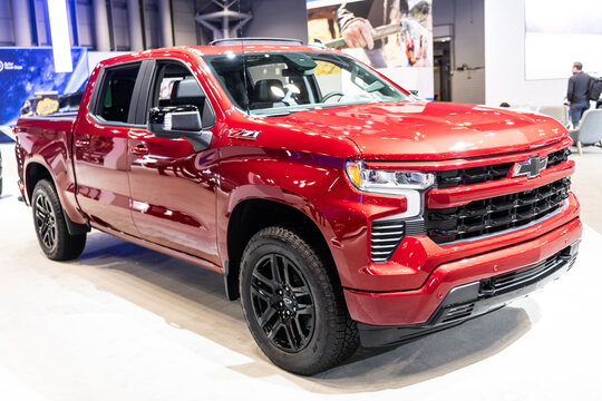 New York City, USA - March 27, 2024: Auto Show 2024. Chevrolet Silverado 1500 car. Chevrolet Silverado 1500 V8 pickup truck. Chevrolet Chevy Silverado 1500 full size pickup red color, corner view