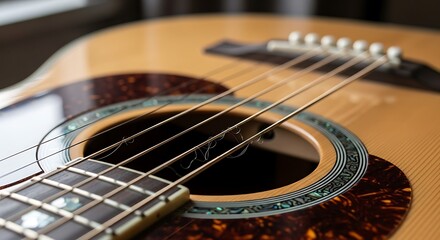 Fototapeta premium Close up view captures the intricate details of an acoustic musical instrument's body and fretboard