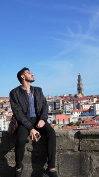 Solo Traveler Visiting Historic Landmark in Porto Portugal