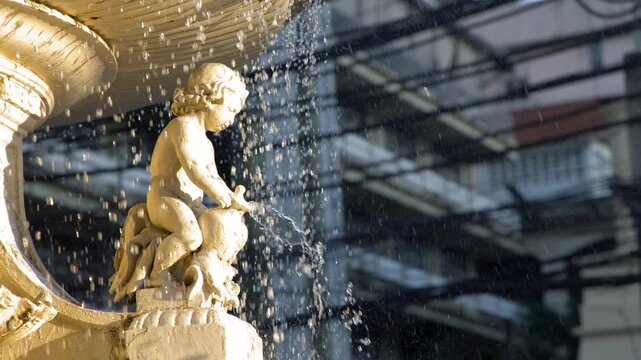 Close Up of Water Splashing from Carriedo Fountain Cherub Statue in Manila