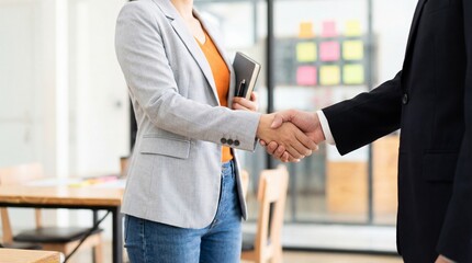 Business people shaking hands in office