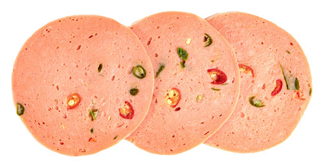 Three slices of spicy bologna sausage with pieces of red and green chili pepper embedded.Top view of gourmet deli meat for sandwiches and snack platters. © sirawut