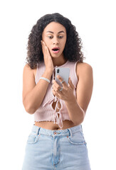 Surprised young African-American woman with modern mobile phone on white background
