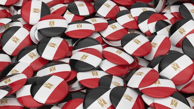 Pile of round button badges featuring the national flag of Egypt with golden eagle