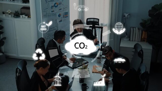 A group of engaged professionals collaborate in an office setting, discussing sustainability and carbon reduction strategies, depicted with relevant icons and graphics. Raster