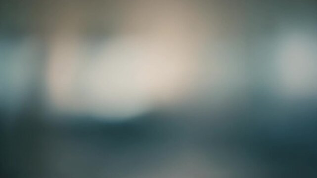 Abstract blurred background with bokeh effect and muted color palette, perfect for minimalist design and subtle visual elements