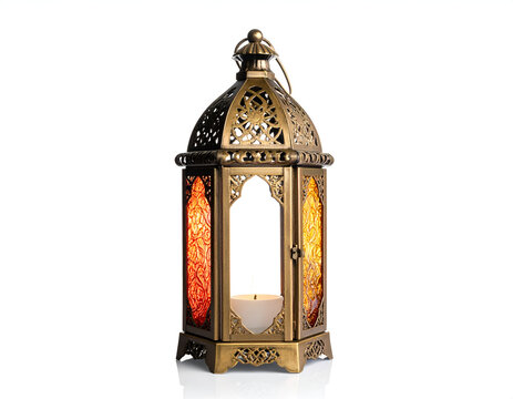 Ornate metal lantern with colored glass panels holding a lit candle