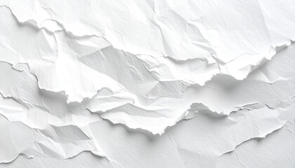 Obraz premium Close-up of ripped and crumpled white paper. The texture displays shadows and jagged edges with a gradient of whites and grays