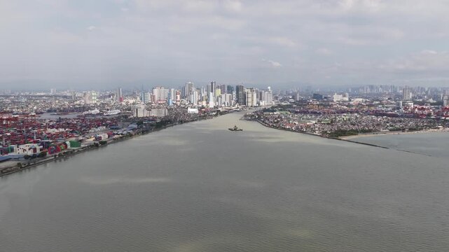 Aerial view of pasig river entering manila bay with cityscape