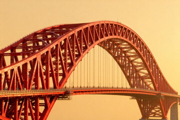 Obraz premium Red Arch Bridge in Warm Sunset Light