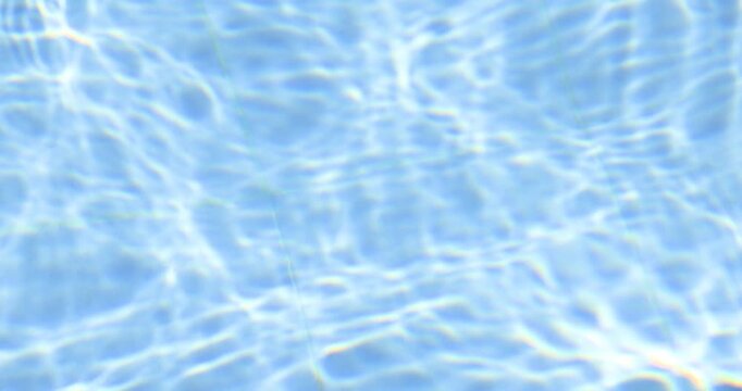 abstract blue swimming pool water with shimmering light reflections and gentle moving ripples, perfect for summer, relaxation, refreshing background, and luxury pool concepts