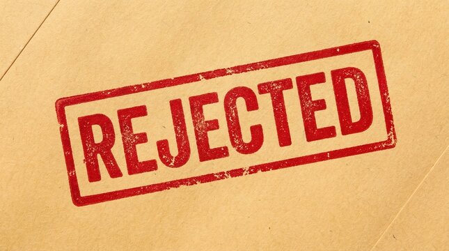 Red REJECTED rubber stamp mark on brown envelope paper, bold distressed typography, official document style, minimal background, strong contrast, business decision concept, realistic close-up.