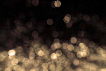 Golden bokeh lights, creating a mesmerizing display