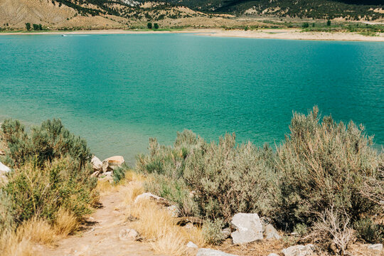 Turqouise blue water at Rifle Gap State Park reservoir