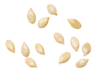 A bunch of seeds are scattered on a white background