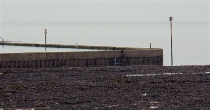 shot of walpole tidal pool at low tide. At Margate.